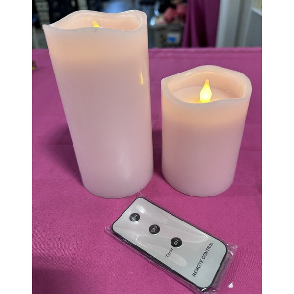 2 Illuminating Pale Pink Candles w/ remote by Valerie Moving wicks 4 & 6 in